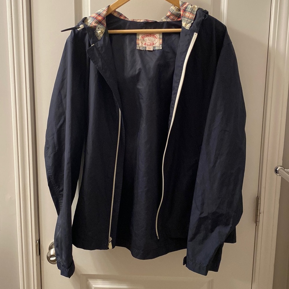 Brooks Brothers navy raincoat.